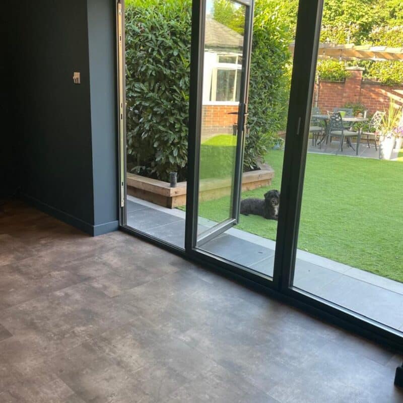 View through Bi-folding doors in a garage conversion Newton Le Willows