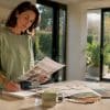 Homeowner reviewing home upgrade brochure