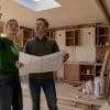 Couple discussing full house renovation in living room