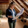 Architect reviewing loft conversion blueprint
