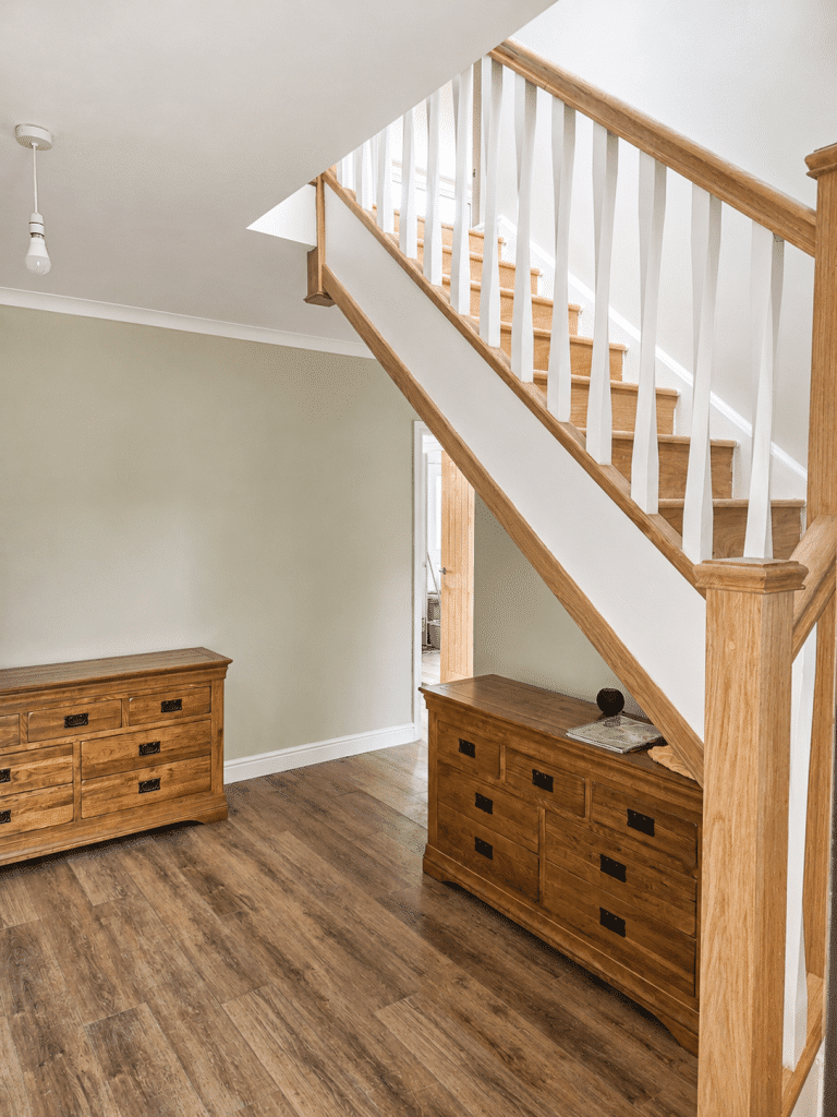Bespoke solid oak staircase installed by Complete Property Solutions during a home renovation project in Southport.