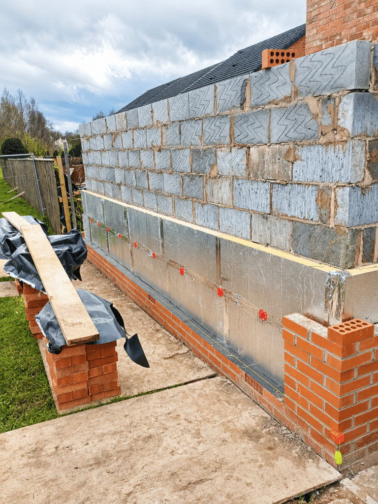 External wall insulation being installed during a house extension project by Complete Property Solutions.