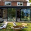 Glass extension under construction on suburban home