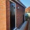 View down the side of a recently built side extension in Newton Le Willows