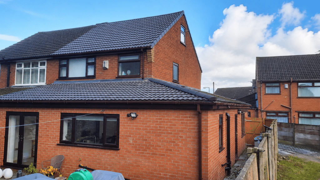 Completed wrap-around house extension in St Helens built by Complete Property Solutions.