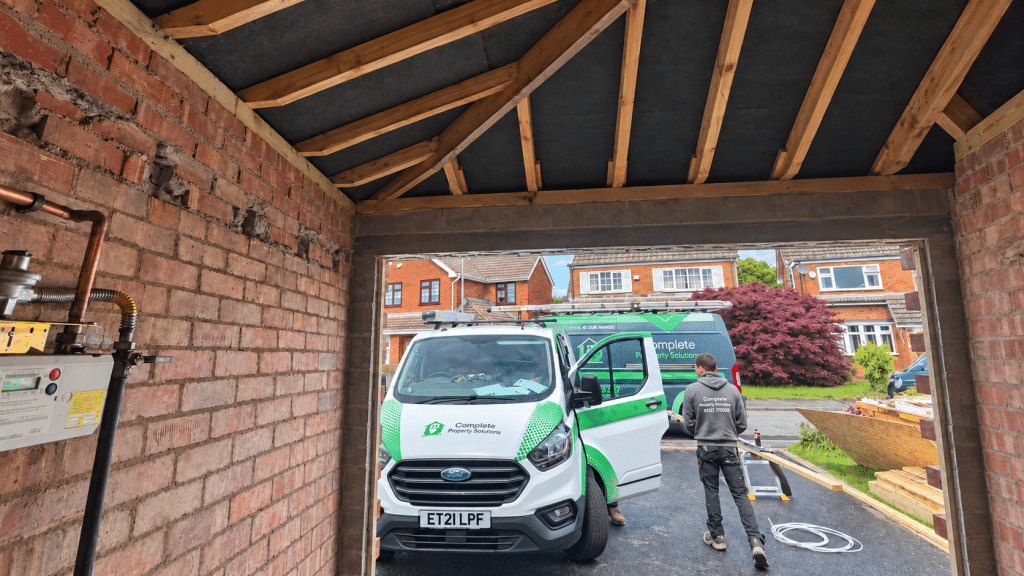 Garage conversion roof construction underway in Eccles by Complete Property Solutions
