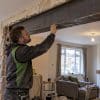 Exposed RSJ spanning a home’s widened opening