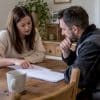 Homeowner reviewing a builder's written quote