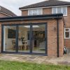 Completed brick rear extension opening onto garden