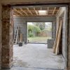 Old extension opening into new construction